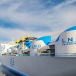 Fleet of offshore vessels moored in Norwegian port at sunny day